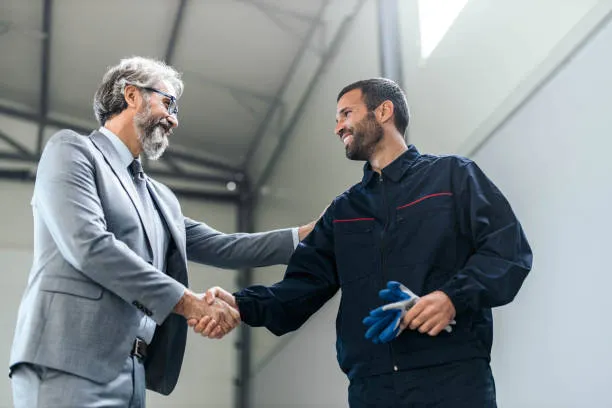 A customer shaking hands with the shop over a claim